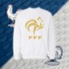 France – شعار منتخب فرنسا بالأحرف العربية