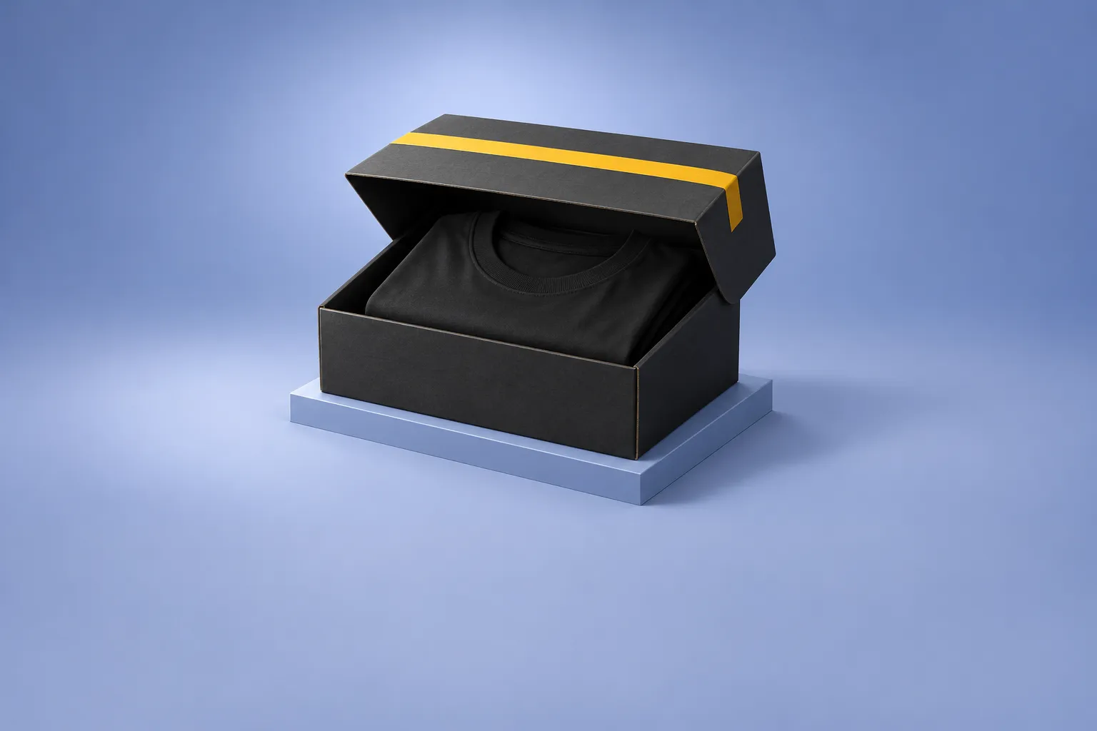 An open black shipping box with a folded black T-shirt inside and a yellow tape band